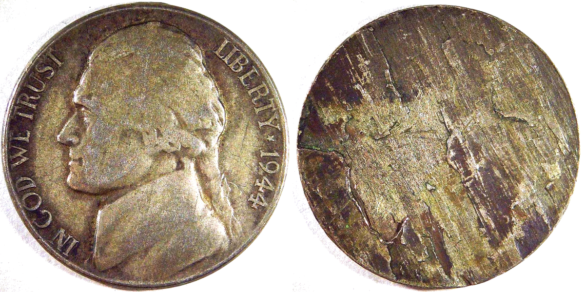 Split planchet error showing the thin half with exposed interior metal