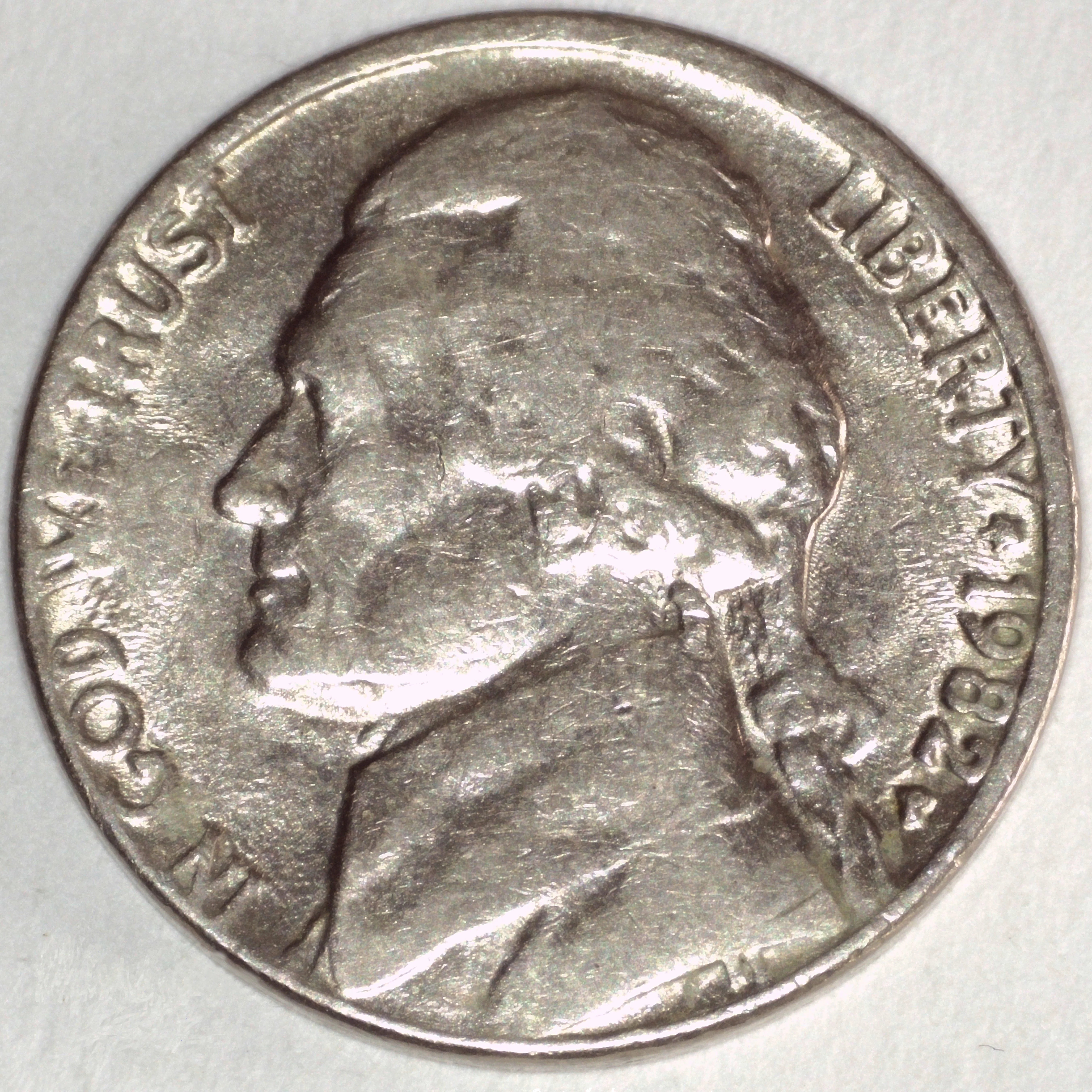 Die deterioration showing soft, blobby design elements