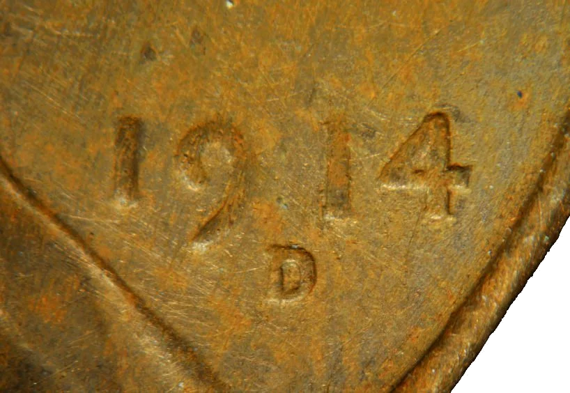 Close-up of date area showing tooling marks on altered coin
