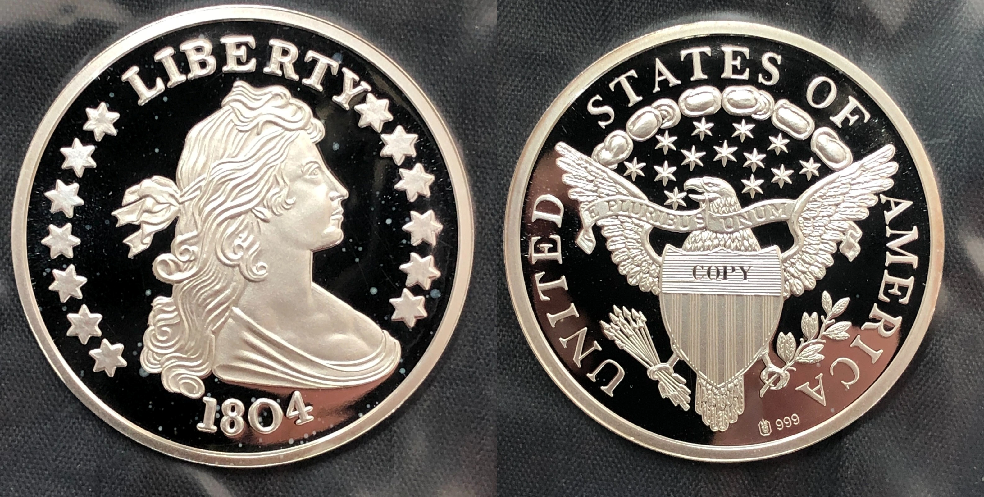 Legitimate replica coin with COPY stamp