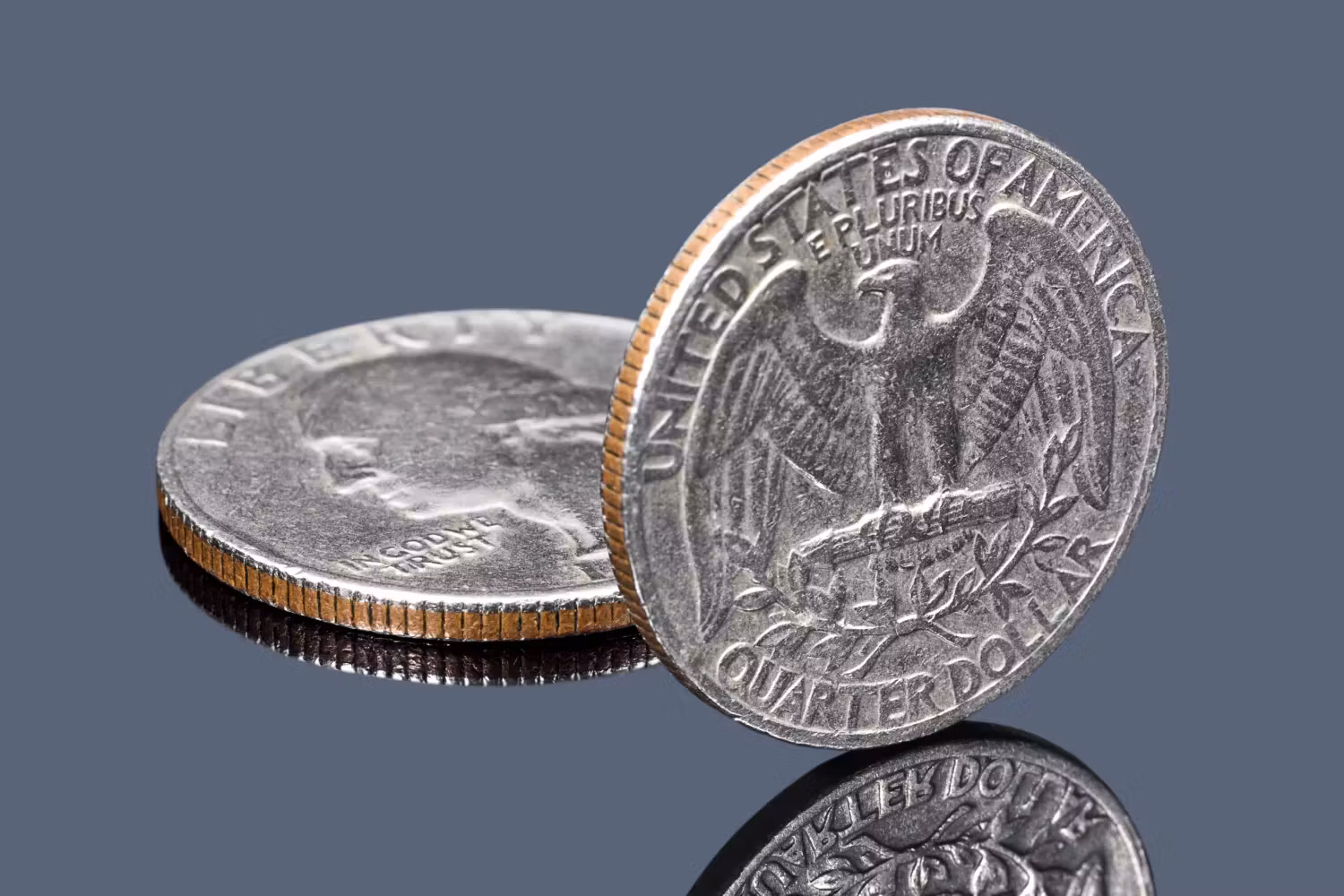 Clad coin edge — copper core sandwich visible