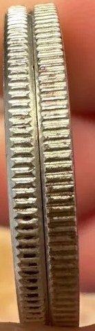 Silver coin edge — solid silver, no copper core visible