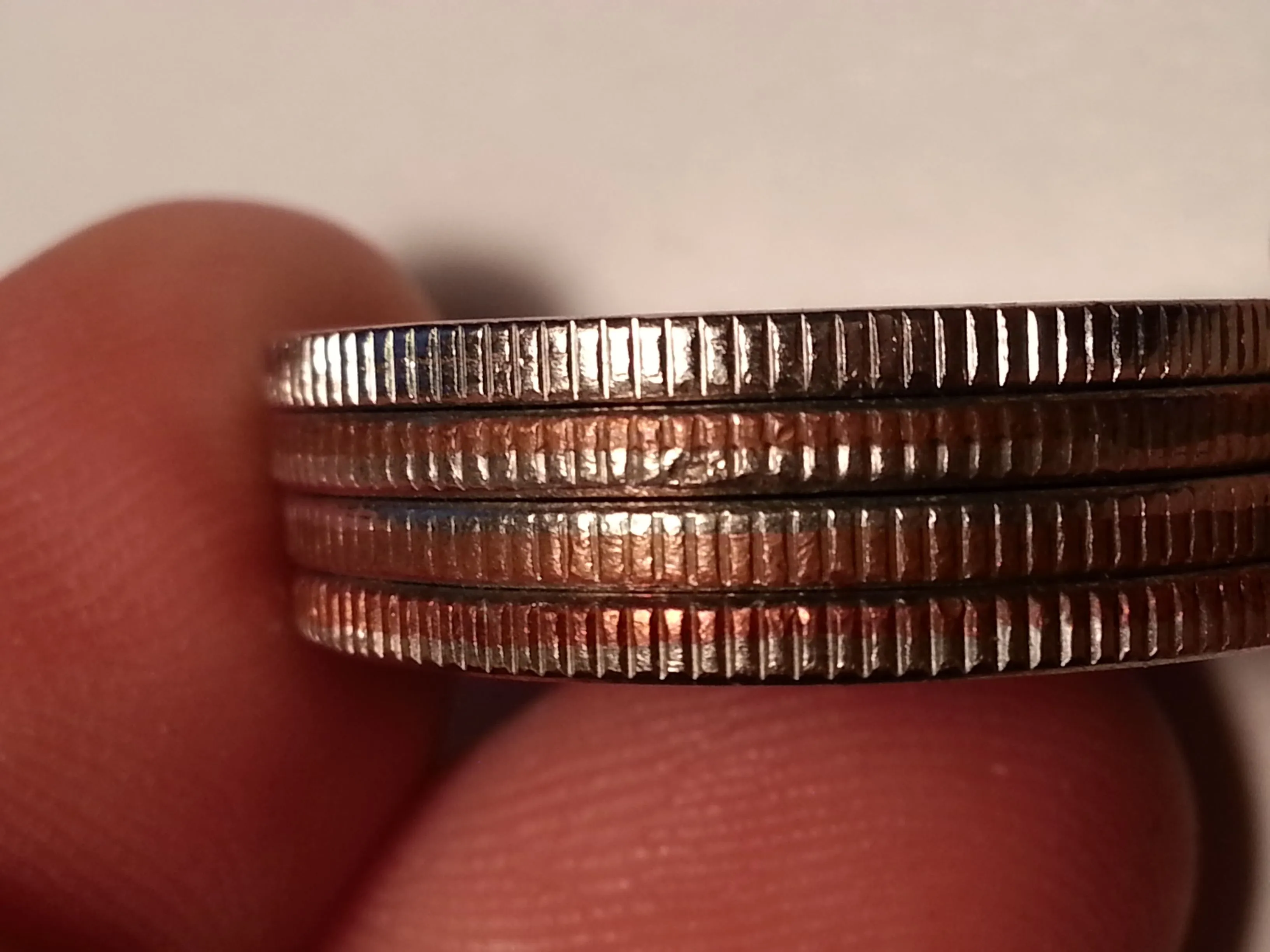 Side-by-side edge comparison — silver vs. clad