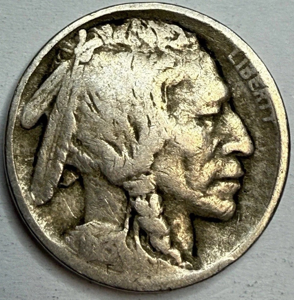 Buffalo nickel with partially visible date