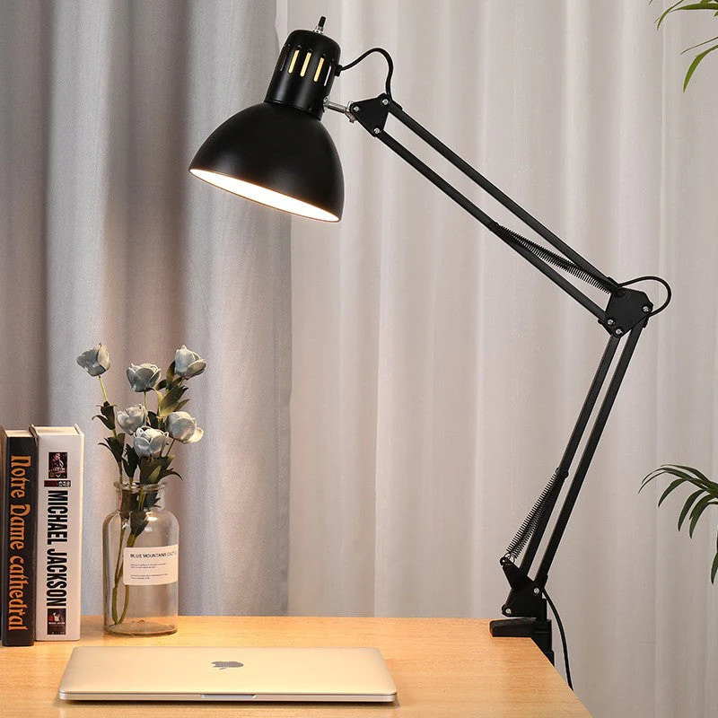 Desk lamp positioned for coin examination