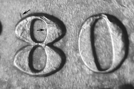 1880-O Morgan Dollar overdate — the 7 visible under the 8 in 1880 over 1879