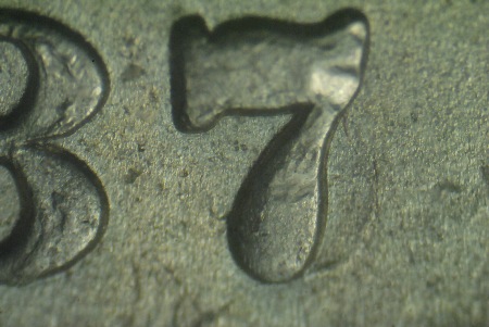 1887-O Morgan Dollar overdate — 1887 over 1886